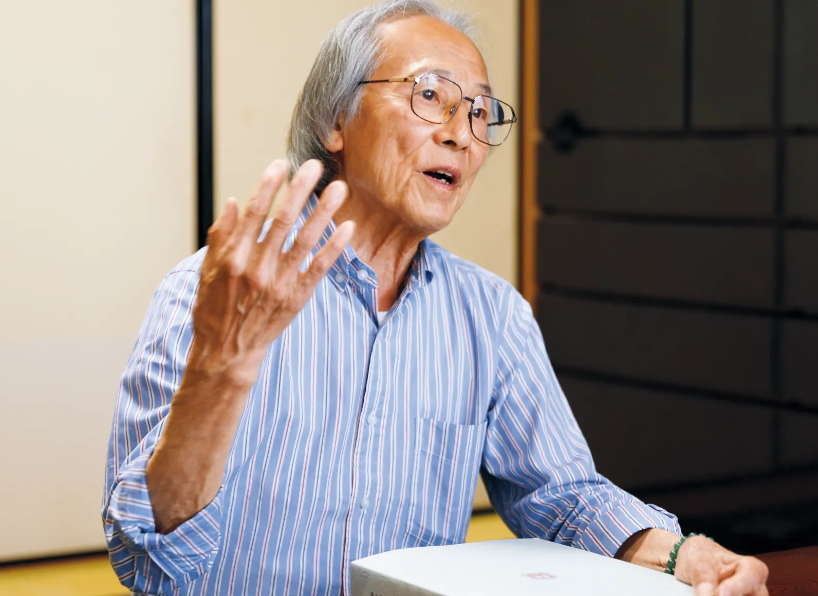 話している川塚さんの画像